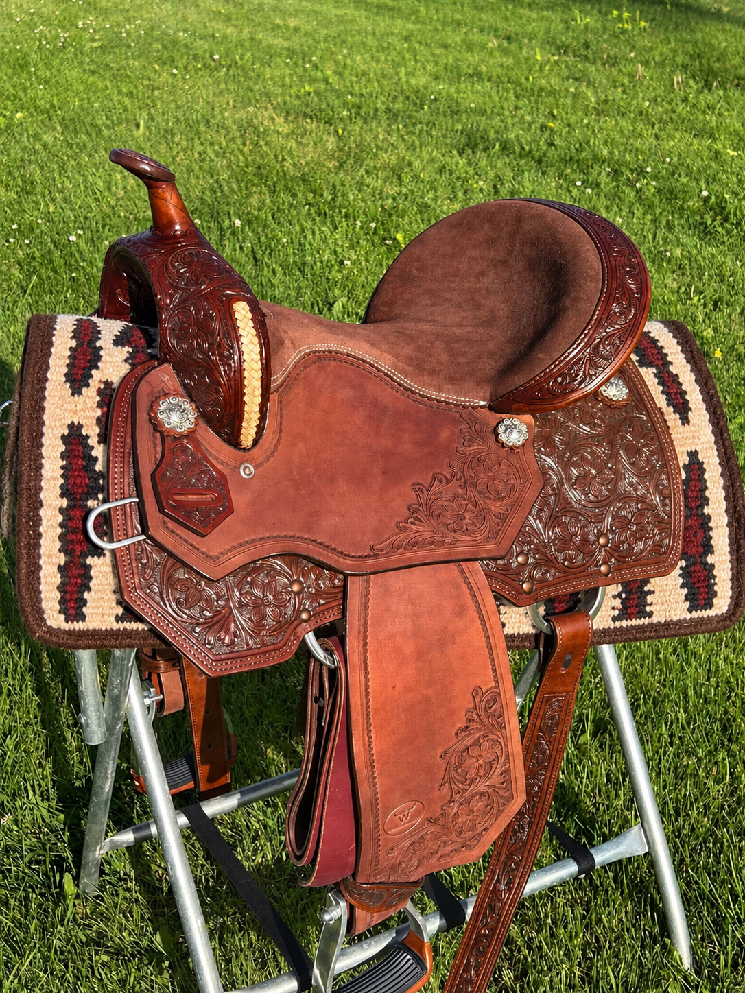 New 15” Western Saddlery floral tooled, braided rawhide, padded seat, 7” gullet