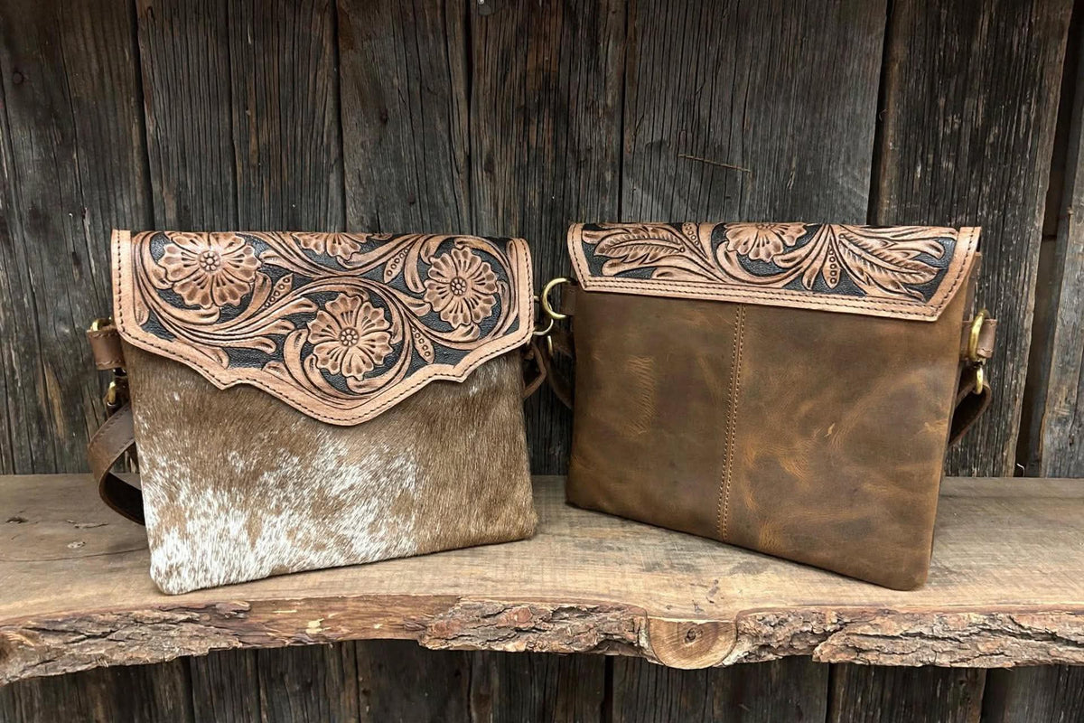 Leather purse with cowhide 9”L x 8”T adjustable shoulder strap included