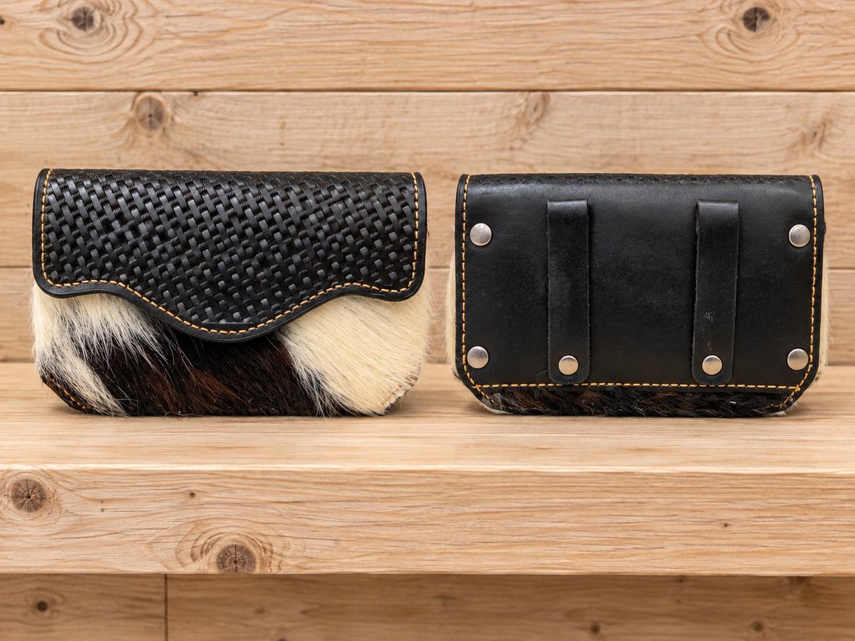 Leather & cowhide cell phone case. 6”x 3.5”