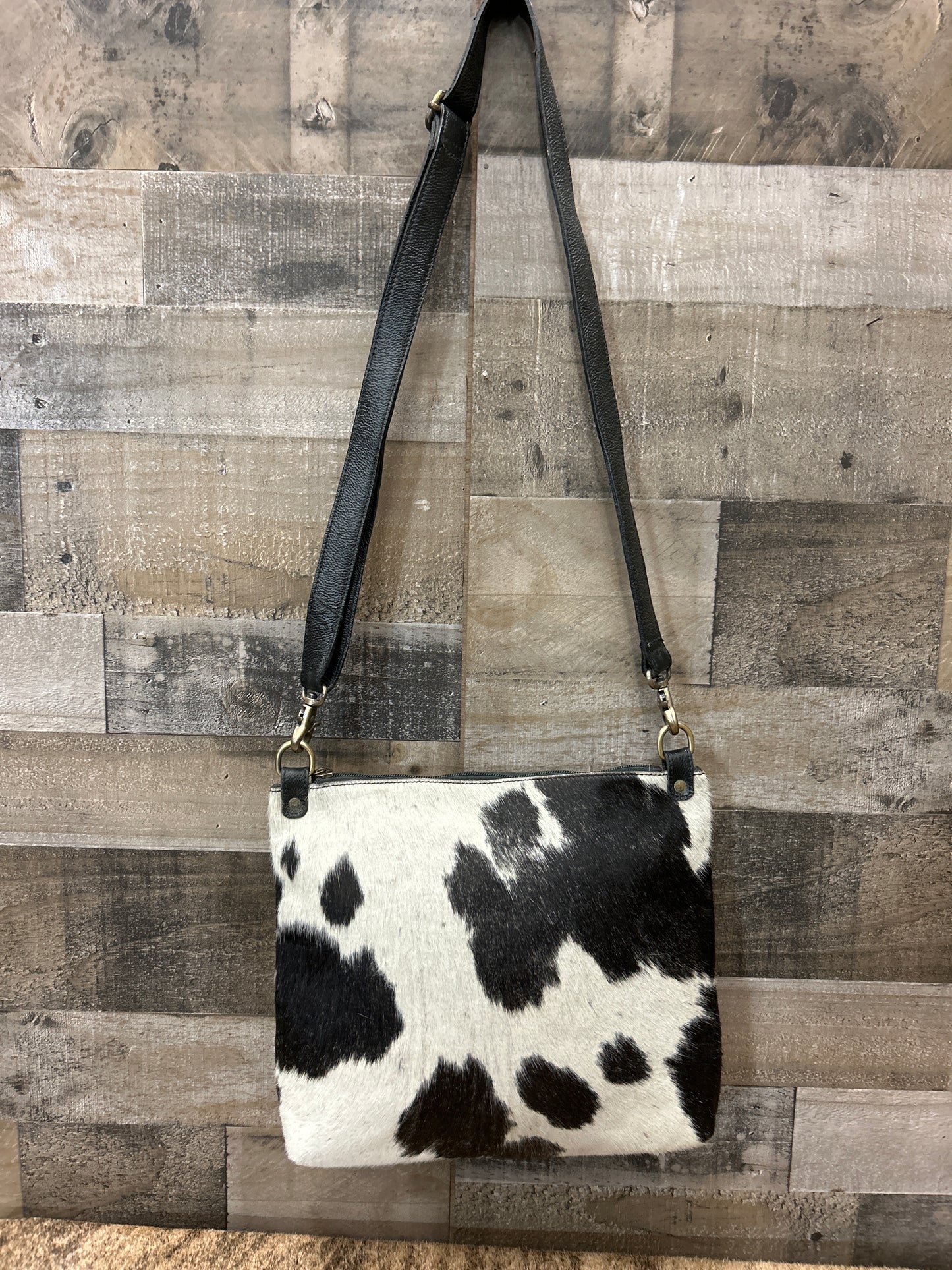 100 % Leather with Cowhide  14x12x2