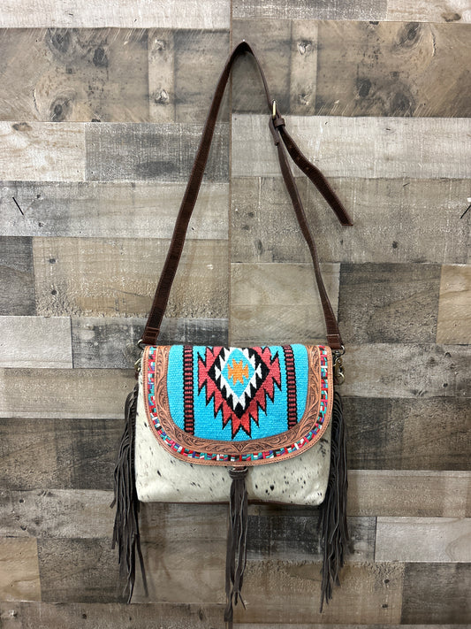 100 % Leather Tooled with Cowhide   13x10x3