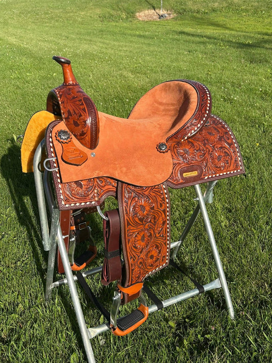 New Western Saddlery Floral tooled , 14” rough out seat, white buckstitching. 7” gullet ￼