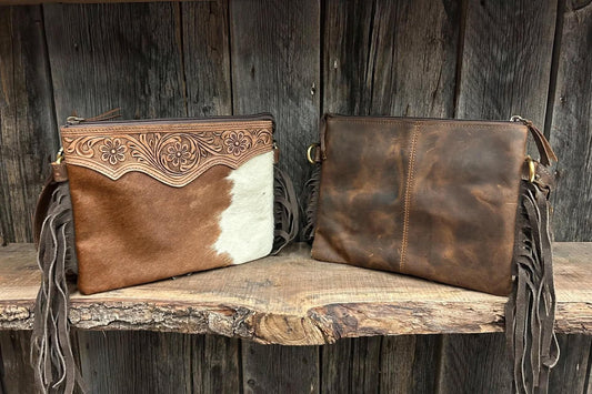 Leather purse with cowhide & fringe 10”L x 8”T adjustable shoulder strap included