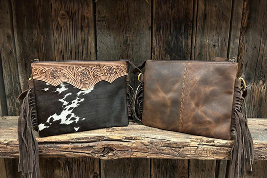 Leather purse with cowhide & fringe 10”L x 8”T adjustable shoulder strap included