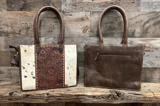 Leather purse with cowhide 14”L x 11”T x 3” W adjustable shoulder strap included