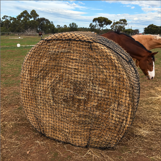 Slow feed 7’x7’ round bale hay net 2”x2” holes