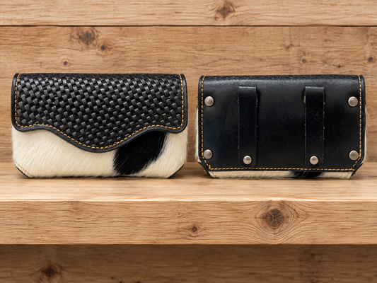 Leather & cowhide cell phone case. 6”x 3.5”